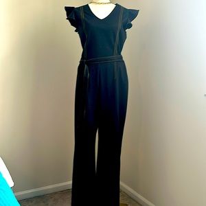 Fun Tahari Jumpsuit w/ Ruffle Cap Sleeve and semi flare bottom..😊